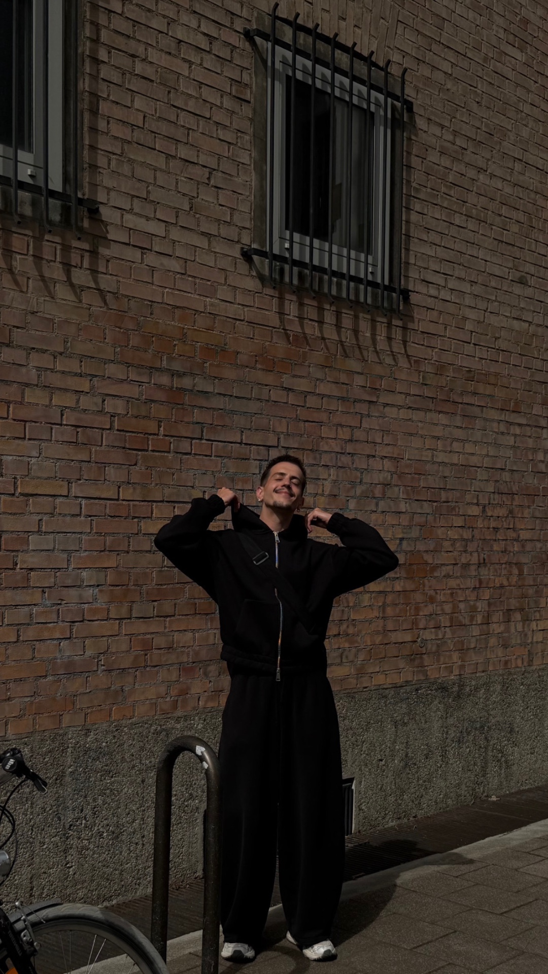 Frantz Seiler — full look styled in Bershka, brick wall street scene